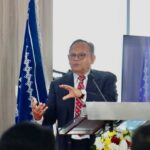 Prof Komarudin