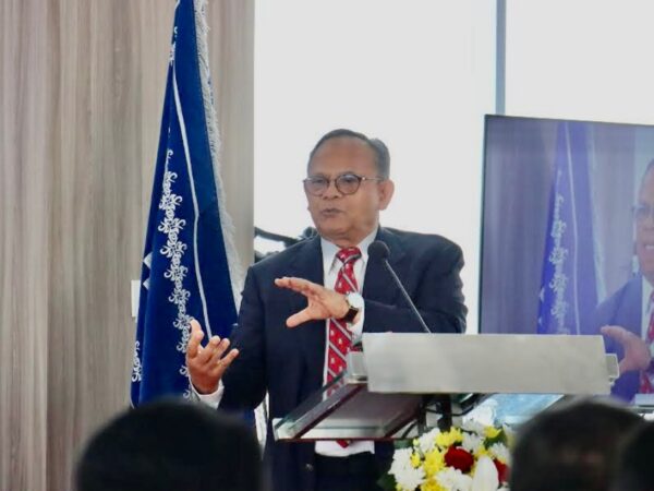 Prof Komarudin