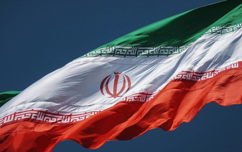 Bendera Iran (unsplash.com/sina-drakhshani)