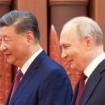 Presiden Rusia Vladimir Putin dan Presiden Tiongkok Xi Jinping bertemu di Beijing [Handout/Kremlin Press Service via Anadolu]