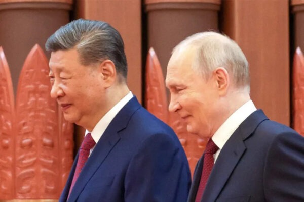 Presiden Rusia Vladimir Putin dan Presiden Tiongkok Xi Jinping bertemu di Beijing [Handout/Kremlin Press Service via Anadolu]