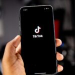 Logo TikTok (dok:Unsplash/Solen Feyissa)
