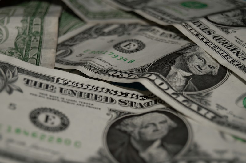 Mata uang AS, Dolar. (Unsplash/Niconor Brown)